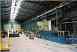 Show image 'Recent view of the steel annex building containing the steel roll forming equipment.' in New Window
