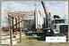 Show image 'Unloading the 10-ft. x 40-ft. panels from IHI trucks.' in New Window