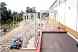 Show image 'Closeup of steel support structure for silos and mixers platform.' in New Window
